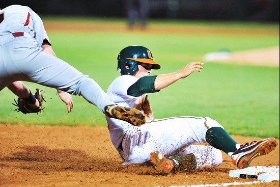 Tyler Palmer successfully steals second base during a conference match-up with Boston College. The Hurricanes swept the Eagles at Alex Rodriguez Park.