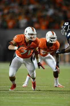 Denensive lineman Anthony Chickillo #71 and the University of Miami Hurricanes defeated the Florida Atlantic Owls at Sun Life Stadium by a final score...