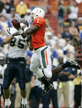 Miami safety Kenny Phillips (1) intercepts the ball from Florida International tight end Eric Kirchenberg in the first quarter of a football game at...