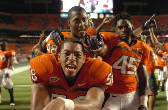 University of Miami Hurricanes linebacker Jordan Futch #58, Andrew Smith #48, and Ramon Buchanan #45 celbrate after defeating the Oklahoma Sooners at...