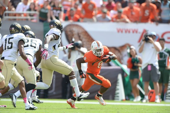 University of Miami Hurricanes running back Duke Johnson #8 plays in a game against the Wake Forest Demon Deacons at Sun Life Stadium on October 26,...