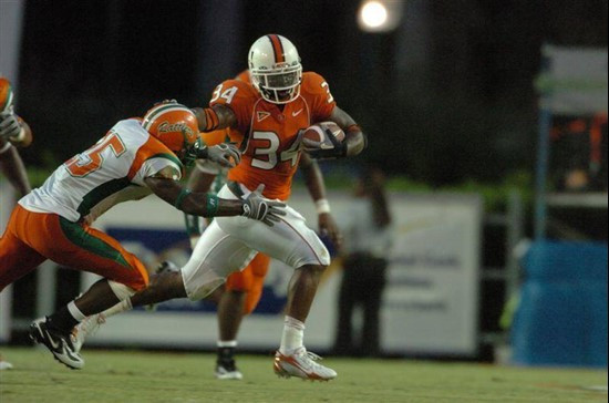 Running back Charlie Jones delivers the stiff arm.