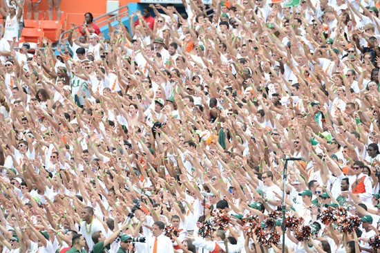 University of Miami Hurricane fans show their team spirit by dressing and creating a ?White Out? in a game against the #12 ranked University of...