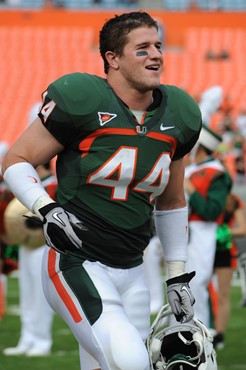 University of Miami Hurricanes linebacker Colin McCarthy #44 plays in a game against the University of South Florida Bulls at Sun Life Stadium on...