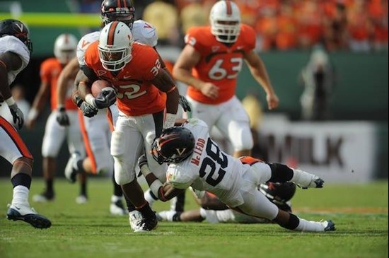 University of Miami Hurricanes running back Lee Chambers #32 plays in a game against the Virginia Cavaliers at Land Shark Stadium on November 7, 2009....