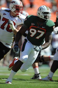 University of Miami Hurricanes defensive lineman Adewale Ojomo #97 plays in a game against the Maryland Terrapins at Sun Life Stadium on November 6,...