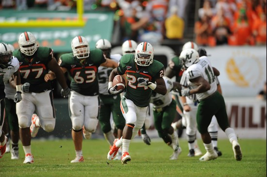 University of Miami Hurricanes running back Storm Johnson #24 scores a touchdown in a game against the University of South Florida Bulls at Sun Life...
