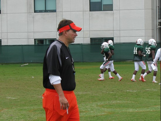 Head Coach Al Golden takes in the team's first practice of the day on Wednesday.
