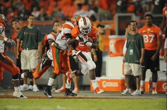 University of Miami Hurricanes running back Damien Berry #20 carries the ball against the FAMU Rattlers at Sun Life Stadium on September 2, 2010. ...