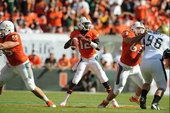 University of Miami Hurricanes quarterback Jacory Harris #12 gets set in shotgun formation during a game against the Georgia Tech Yellow Jackets at...