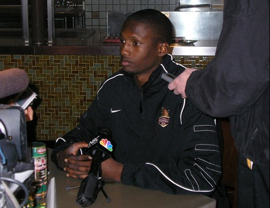 Freshman quarterback Jacory Harris speaks with reporters at AT&T Park on Tuesday.