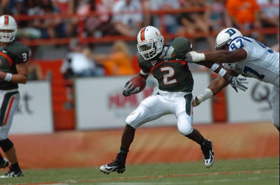 University of Miami running back Graig Cooper #2 rushes past a defender in a game against the Duke University Blue Devils at the Orange Bowl on...