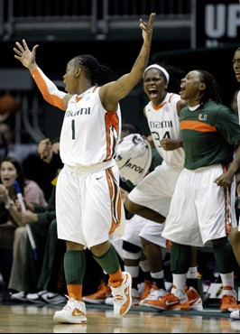 Miami's Riquna Williams (1) reacts after hitting a three-pointer during the second half. (AP Photo/Lynne Sladky)