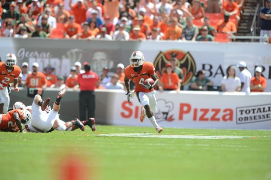 University of Miami Hurricanes wide receiver Phillip Dorsett #4 plays in a game against the North Carolina State Wolfpack at Sun Life Stadium on...