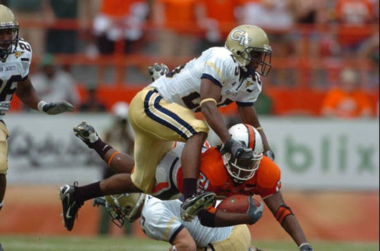 University of Miami running back Derron Thomas #21 rushes in a game against the Georgia Tech Yellow Jackets at the Orange Bowl on October 13, 2007. ...