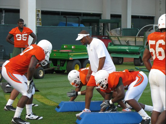 Micheal Barrow and the defensive line at practice Thursday morning at the Greentree Practice Fields.