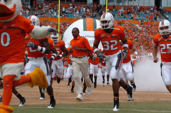 Head coach Randy Shannon leads his University of Miami Hurricanes on the field in a game against the North Carolina Tar Heels at Dolphin Stadium on...