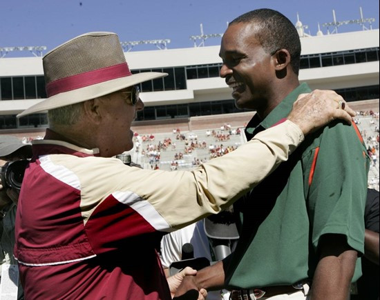 Florida State head coach Bobby Bowden, left, and Miami head coach Randy Shannon meet prior to the start of the game. (AP Photo/Steve Cannon)