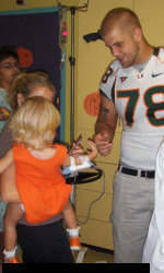 Coker, Players Visit Miami Children's Hospital