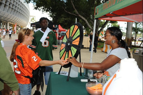 University of Miami Hurricane fans enjoy tailgating before a game against the Georgia Tech Yellow Jackets at Sun Life Stadium on October 22, 2011. ...