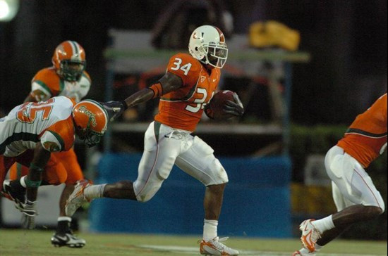 Running back Charlie Jones delivers the stiff arm.