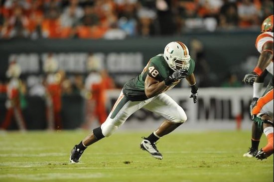 University of Miami Hurricanes defensive lineman Andrew Smith #48 plays in a game against the Florida A&M Rattlers at Land Shark Stadium on October...
