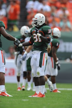 University of Miami Hurricanes linebacker Sean Spence #31 plays in a game against the University of South Florida Bulls at Sun Life Stadium on...