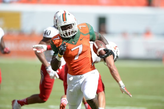 University of Miami Hurricanes running back Gus Edwards #7 and the Canes take on the Cincinnati Bearcats at Sun Life Stadium on October 11, 2014. ...