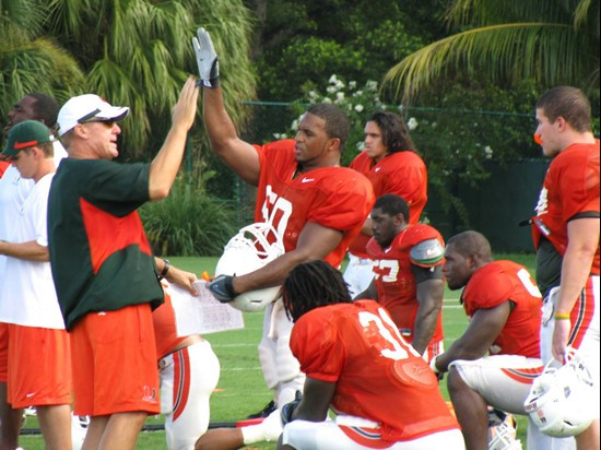 John Lovett and Darryl Sharpton (50) at practice Sunday morning at the Greentree Practice Fields.