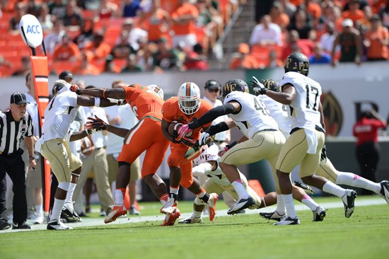 University of Miami Hurricanes defensive back Tracy Howard #3 catches a pass in a game against the Wake Forest Demon Deacons at Sun Life Stadium on...