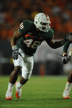 University of Miami Hurricanes defensive lineman Andrew Smith #48 plays in a game against the North Carolina Tar Heels at Sun Life Stadium on October...