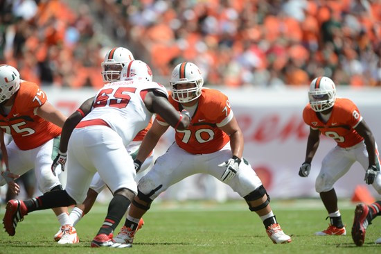 University of Miami Hurricanes offensive lineman Jonathan Feliciano #70 plays in a game against the North Carolina State Wolfpack at Sun Life Stadium...