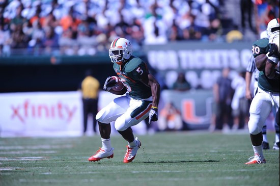 University of Miami Hurricanes running back Mike James #5 carries the ball against the Maryland Terrapins at Sun Life Stadium on November 6, 2010. ...