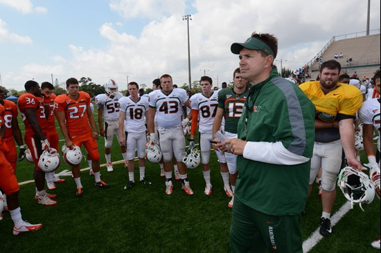 Al Golden talks to the team after Saturday's scrimmage