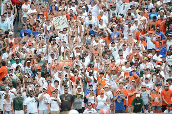 University of Miami Hurricanes fans celebrate after the Canes score a touchdown in a game against the #12 ranked University of Florida Gators at Sun...