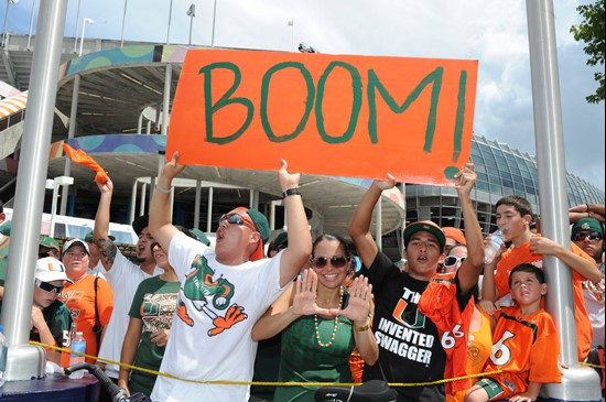 Fans wait for the Hurricanes forming a human tunnel at SunLife Stadium before a game against the Kansas State Wildcats on September 24, 2011.  Photo...