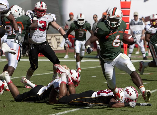 University of Miami Hurricane #6 Lamar Miller carries the ball during a game against the Maryland Terrapins at at Sun Life Stadium on November 6,...