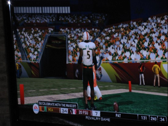 Jason Fox and Randy Phillips taking on Christian Ponder and Dekota Watson in NCAA 10 at the 2009 ACC Football Kickoff.