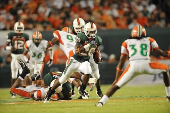 University of Miami Hurricanes running back Damien Berry #20 carries the ball against the Florida A&M Rattlers at Land Shark Stadium on October 10,...