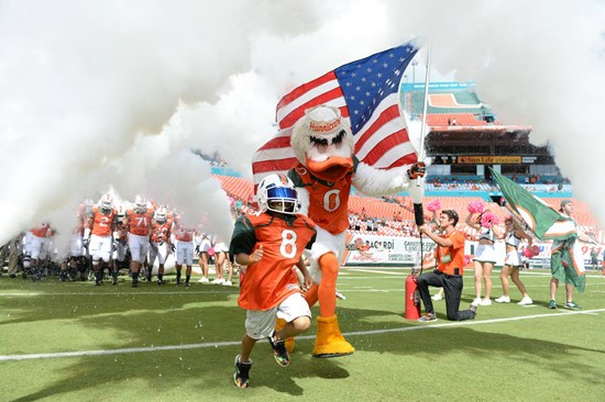 University of Miami Hurricane fan Carter Huck had his dream come true as he got to run through a tunnel of smoke with Sebastian the Ibis and the...