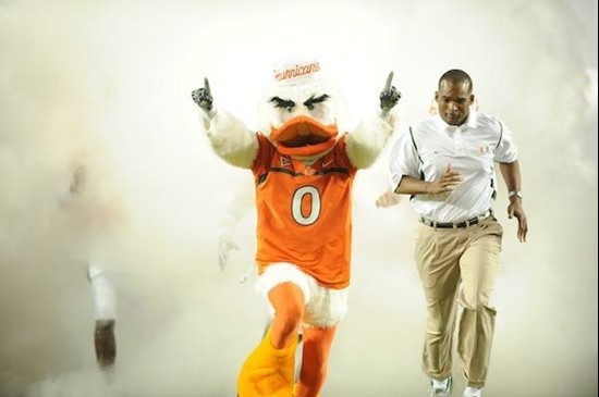 Sebastian the Ibis leads the University of Miami Hurricanes through a tunnel of smoke in  a game against the Oklahoma Sooners at Land Shark Stadium on...