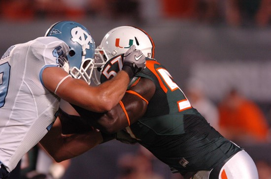 University of Miami Hurricanes defensive lineman Allen Bailey #57 plays in a game against the North Carolina Tar Heels at Sun Life Stadium on October...