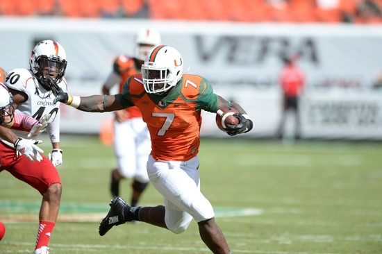 University of Miami Hurricanes running back Duke Johnson #8 plays in a game against the Cincinnati Bearcats at Sun Life Stadium on October 11, 2014.  ...