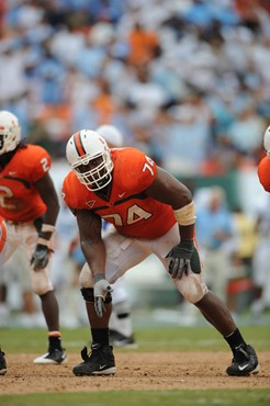 University of Miami Hurricanes offensive lineman Orlando Franklin #74 gets set to block against the North Carolina Tar Heels at Dolphin Stadium on...