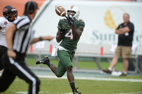 ass from quarterback Brad Kaaya in a game against the Arkansas State Red Wolves at Sun Life Stadium on September13, 2014.  Photo by Steven & Matthew...