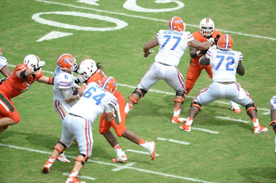 University of Miami Hurricanes defensive lineman Luther Robinson #93 plays in a game against the #12 ranked University of Florida Gators at Sun Life...