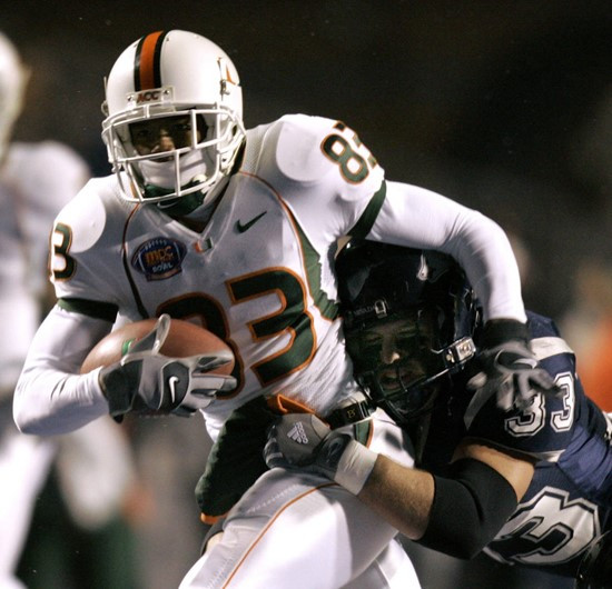 Miami wide receiver Sam Shields is taken down by Nevada linebacker Jason DeMars during the first quarter of the MPC Computers Bowl Sunday, Dec. 31,...