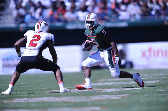 University of Miami Hurricanes running back Mike James #5 carries the ball against the Maryland Terrapins at Sun Life Stadium on November 6, 2010. ...