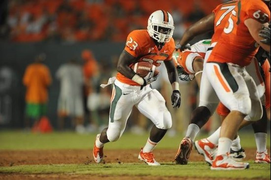 University of Miami Hurricanes running back Eduardo Clements #23 plays in a game against the Florida A&amp;M Rattlers at Sun Life Stadium on September...